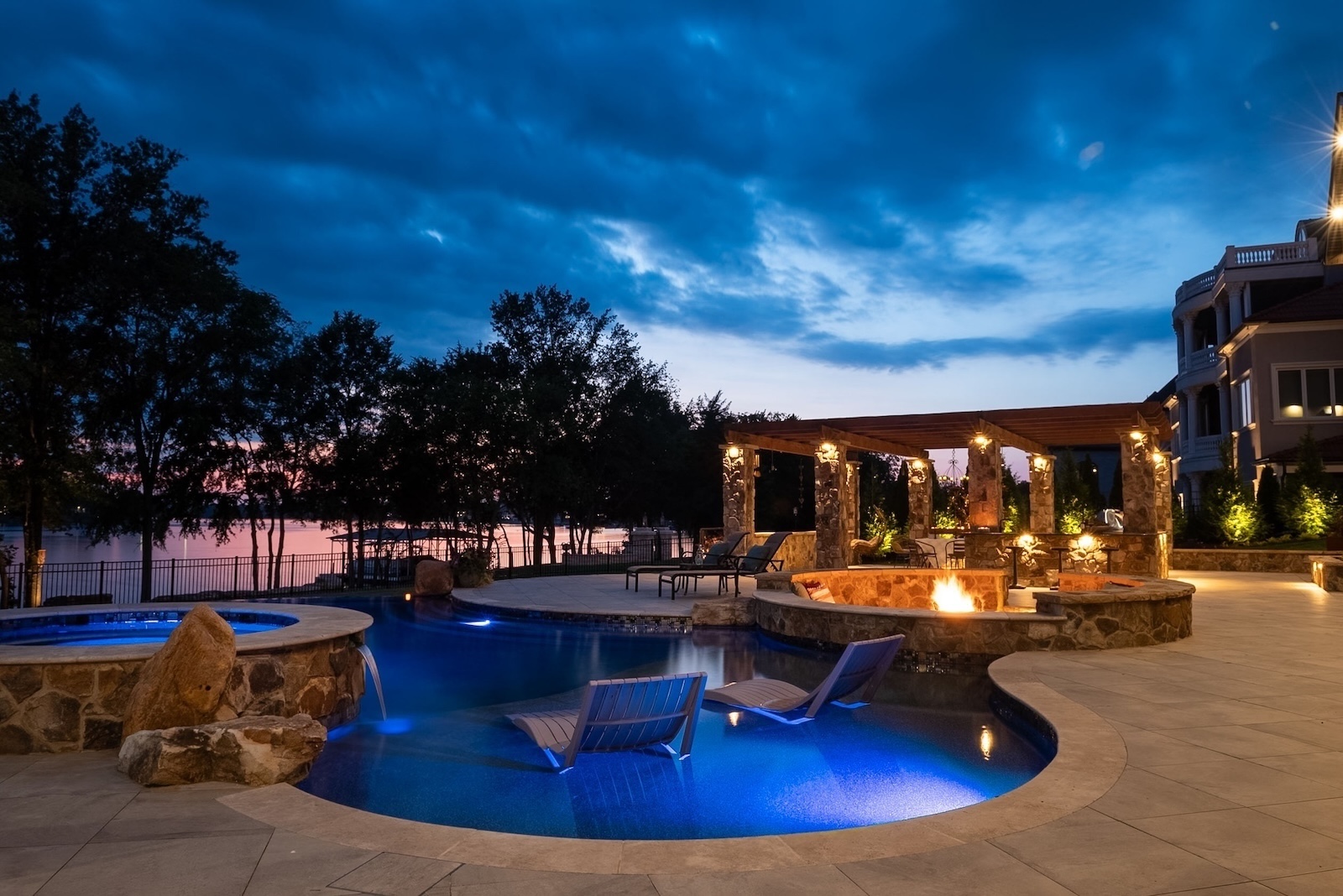 Custom Nashville Pool and Hardscape with View at Night | Milosi Nashville Landscaping
