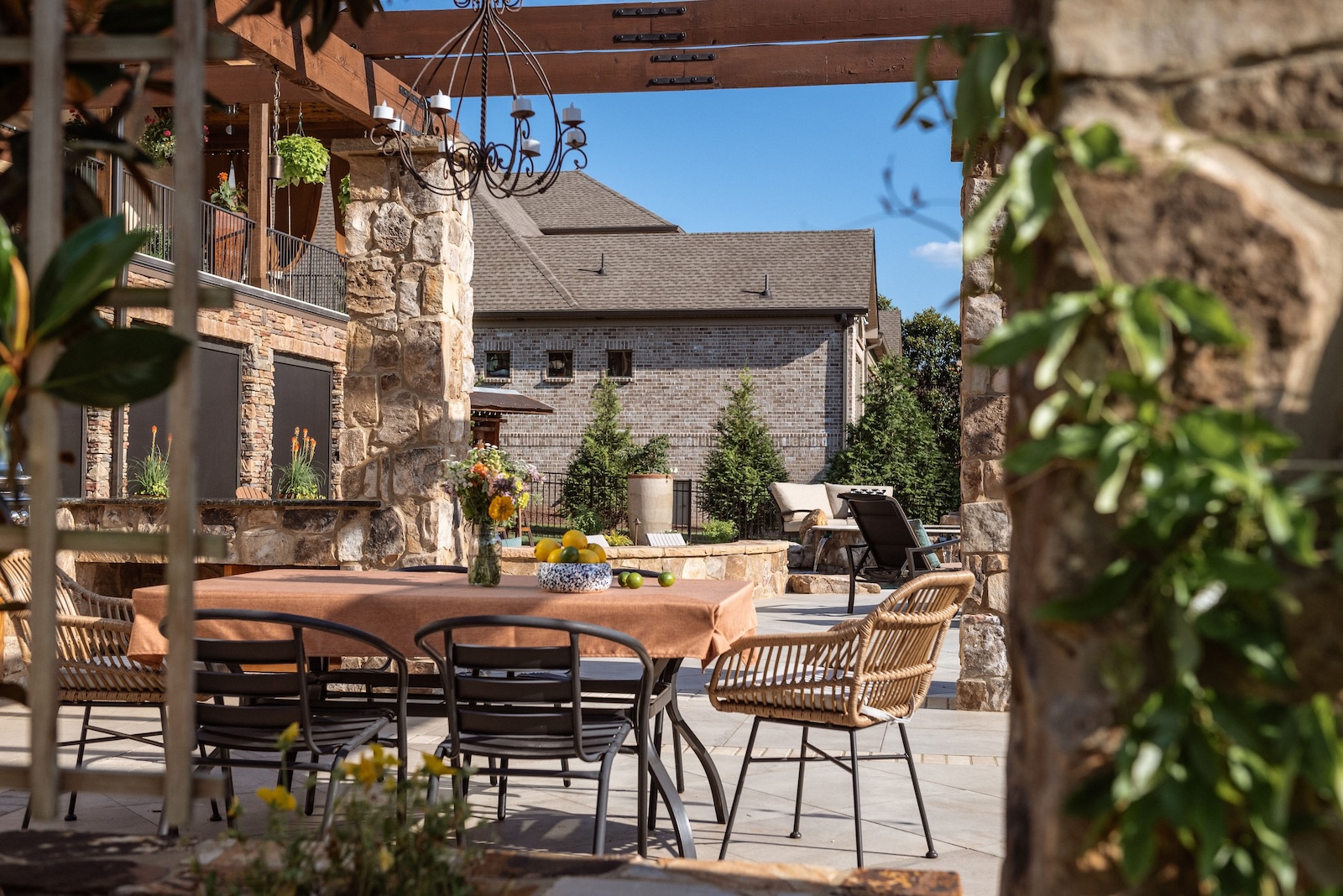 Custom Outdoor Living Area with Seating, Chandelier | Milosi Nashville Landscaping