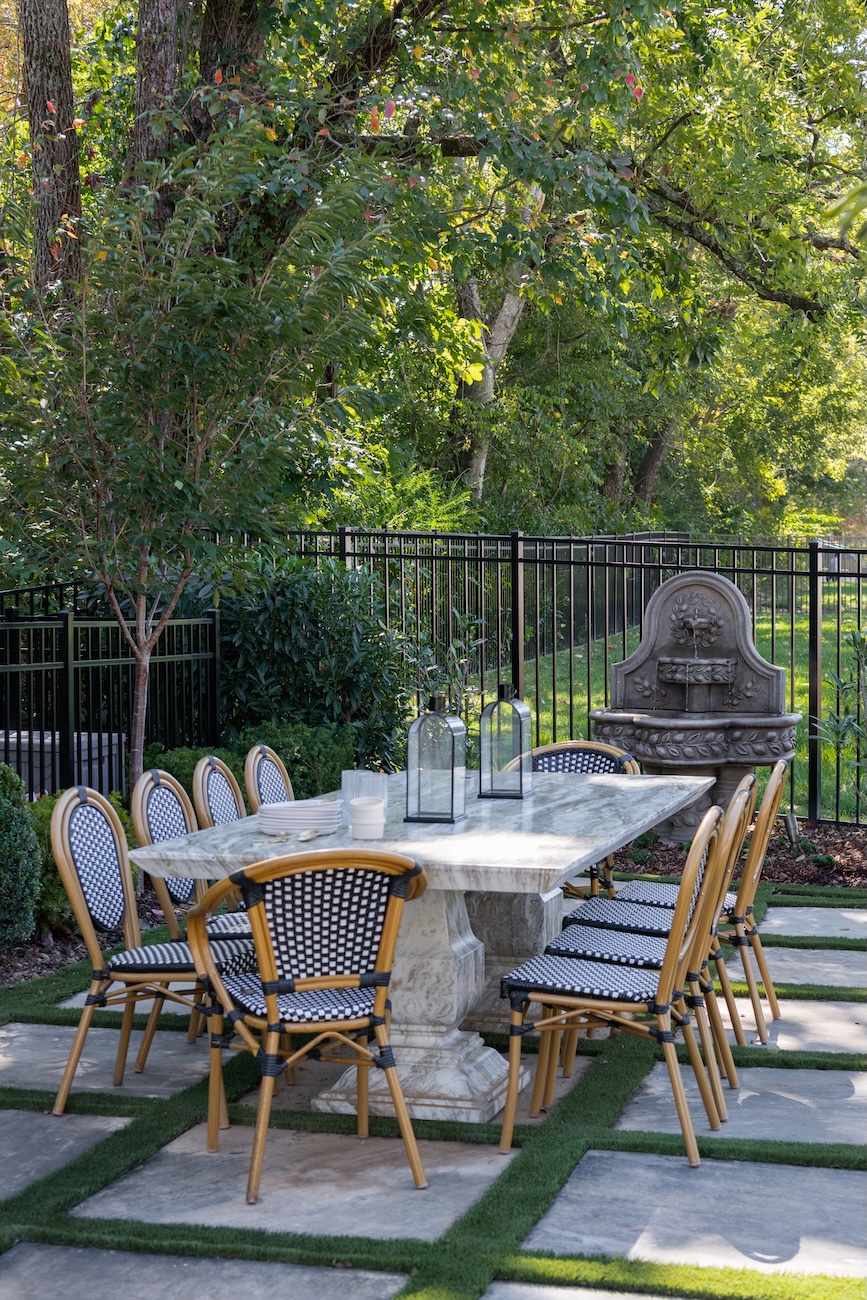 Beautifully Crafted Outdoor Dining Set on Paver Patio with Fountain | Milosi Nashville Landscaping