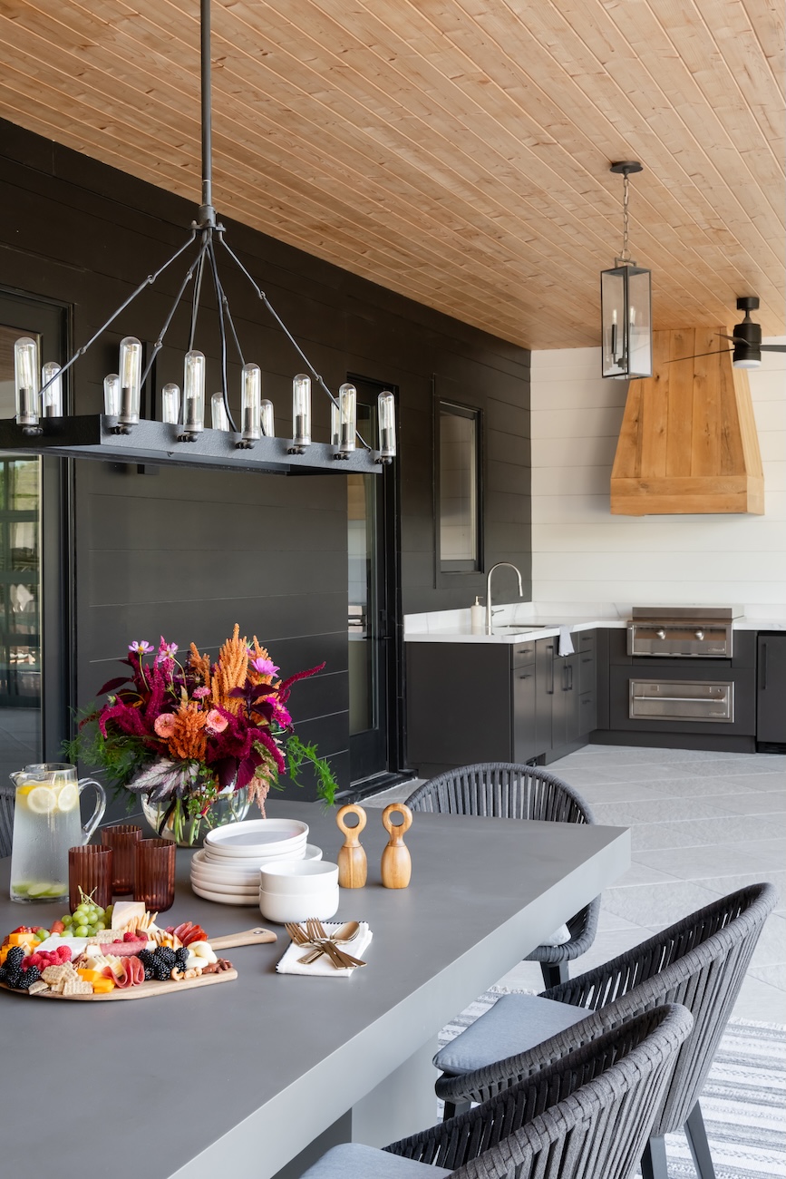 Modern Outdoor Kitchen, Dining Set with Flowers, Overhead Lighting, Custom Sink, Grill | Milosi Landscaping