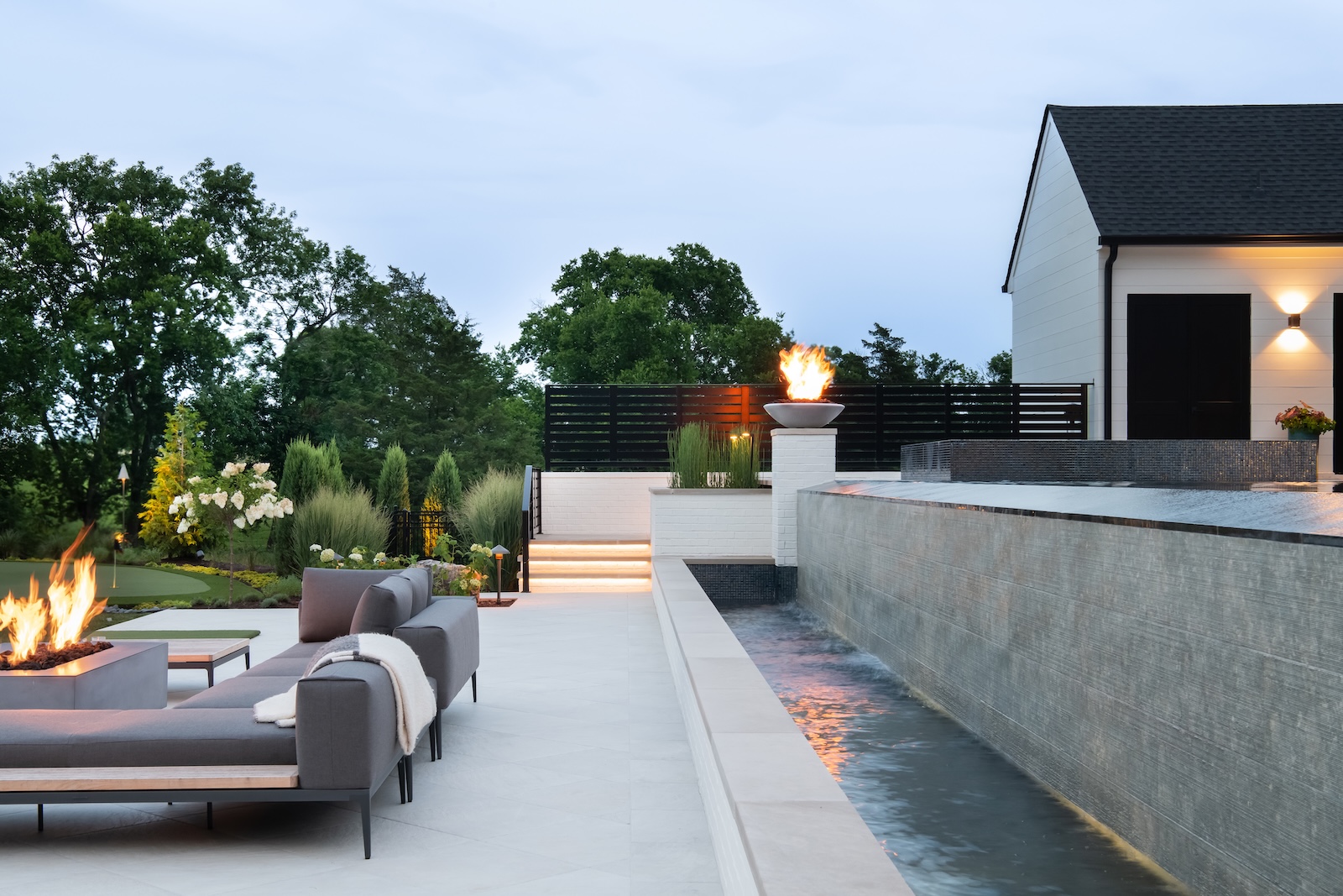 Modern Patio, Lounge Furniture & Throw, Firepits, Cascading Infinity Pool, Putting Green, LED Stairway | Milosi Nashville Landscaping